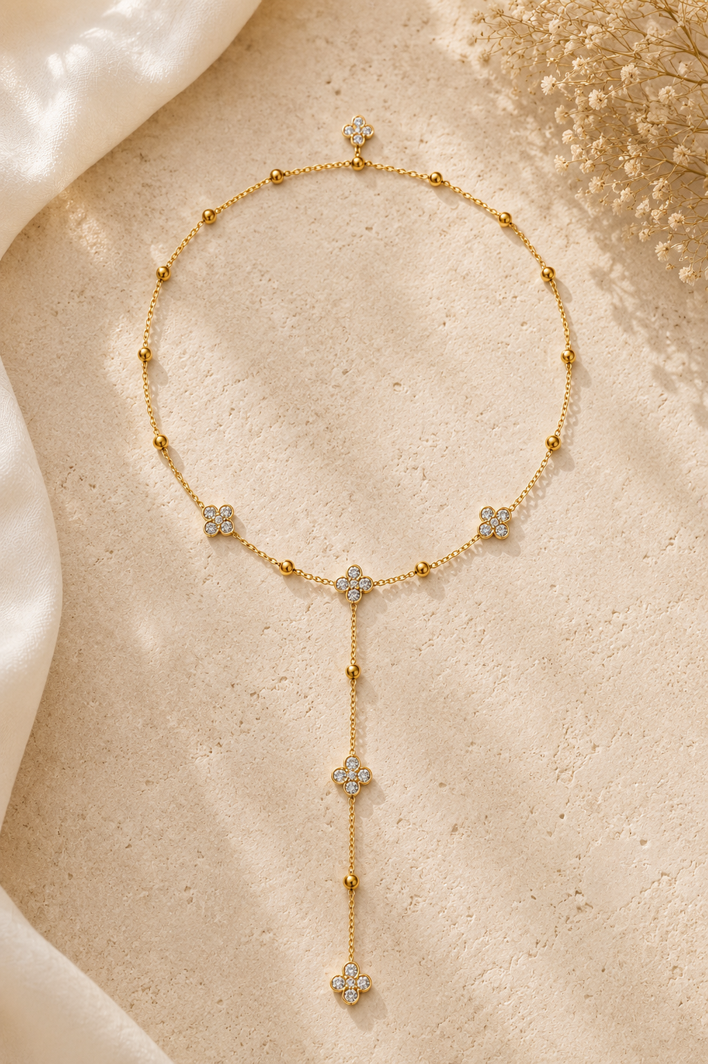 Collier de dos Célestine - Acier inoxydable doré & fleurs scintillantes