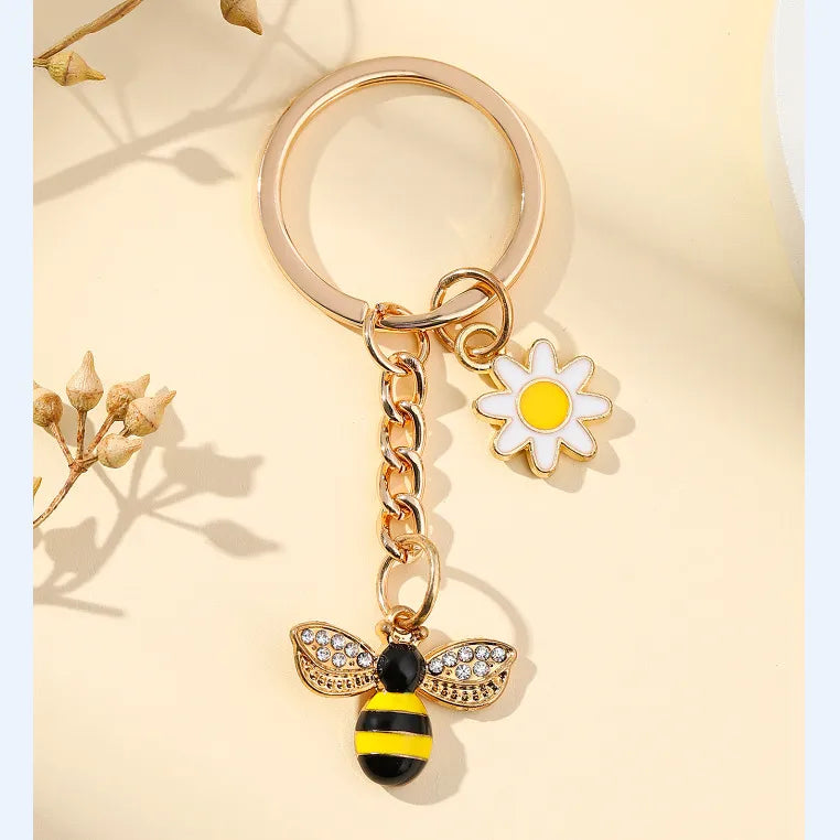 ✨Porte-clés abeille & marguerite doré – Détail fleuri et lumineux • Mélya ✨