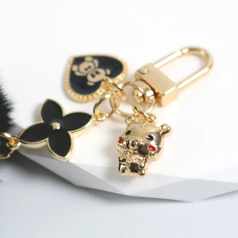 ✨ Porte-clés pompon noir & ourson – Charme doux et tendance • Lunira ✨