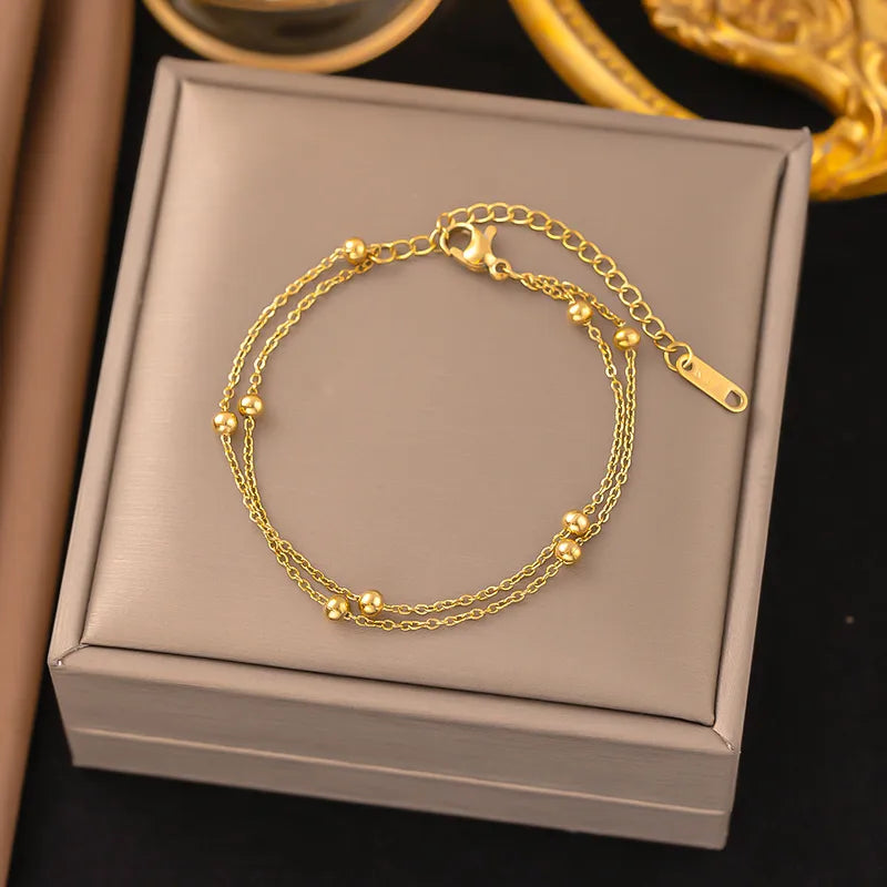 ✨ Bracelet double chaîne & perles – Élégance délicate ✨