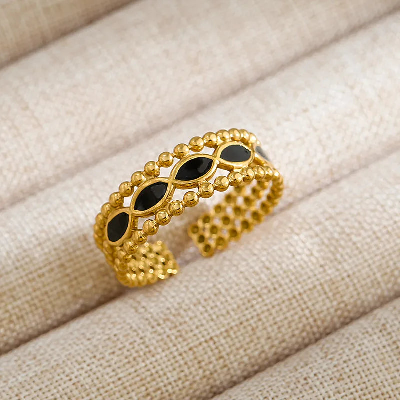 ✨ Bague dorée & incrustations noires – Élégance graphique ✨