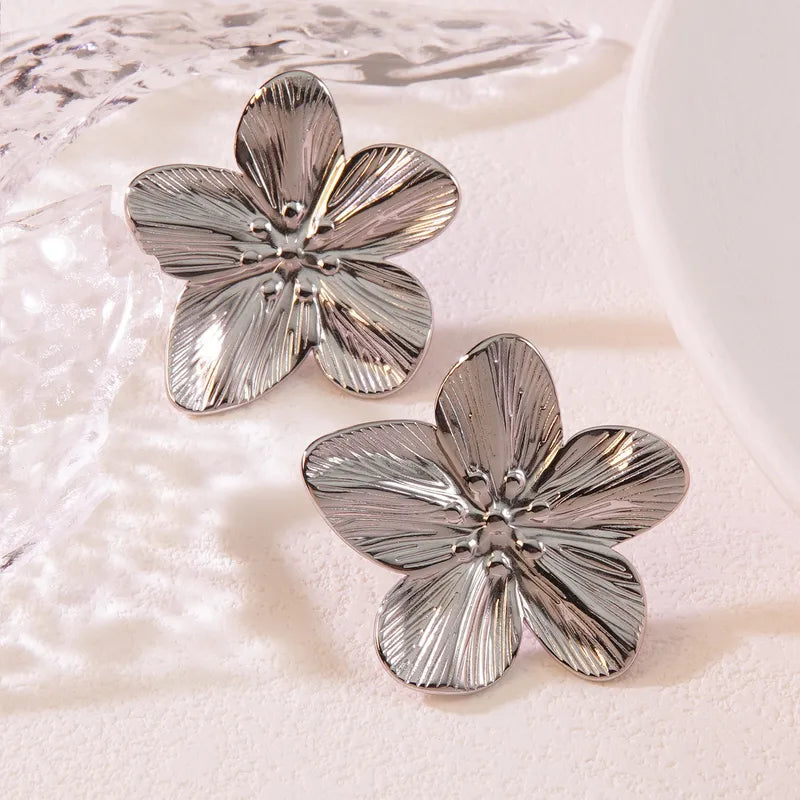✨ Boucles d’oreilles fleurs texturées – Élégance lumineuse ✨
